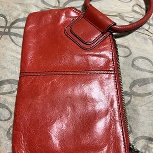 Good used condition hobo sable wristlet. Sienna in color